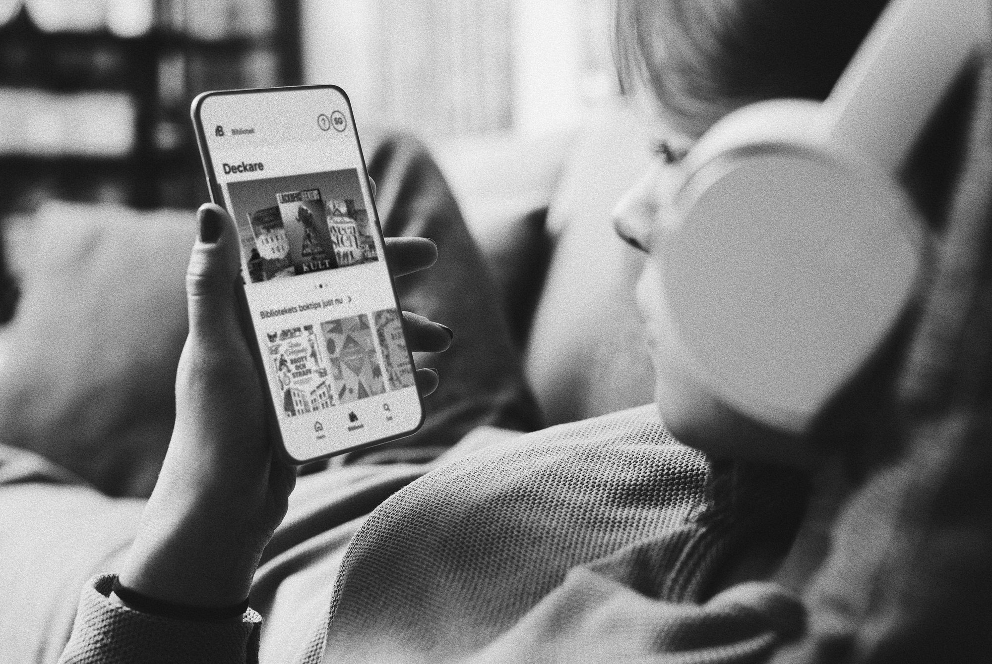 BIB-woman-couch-listening-audiobook